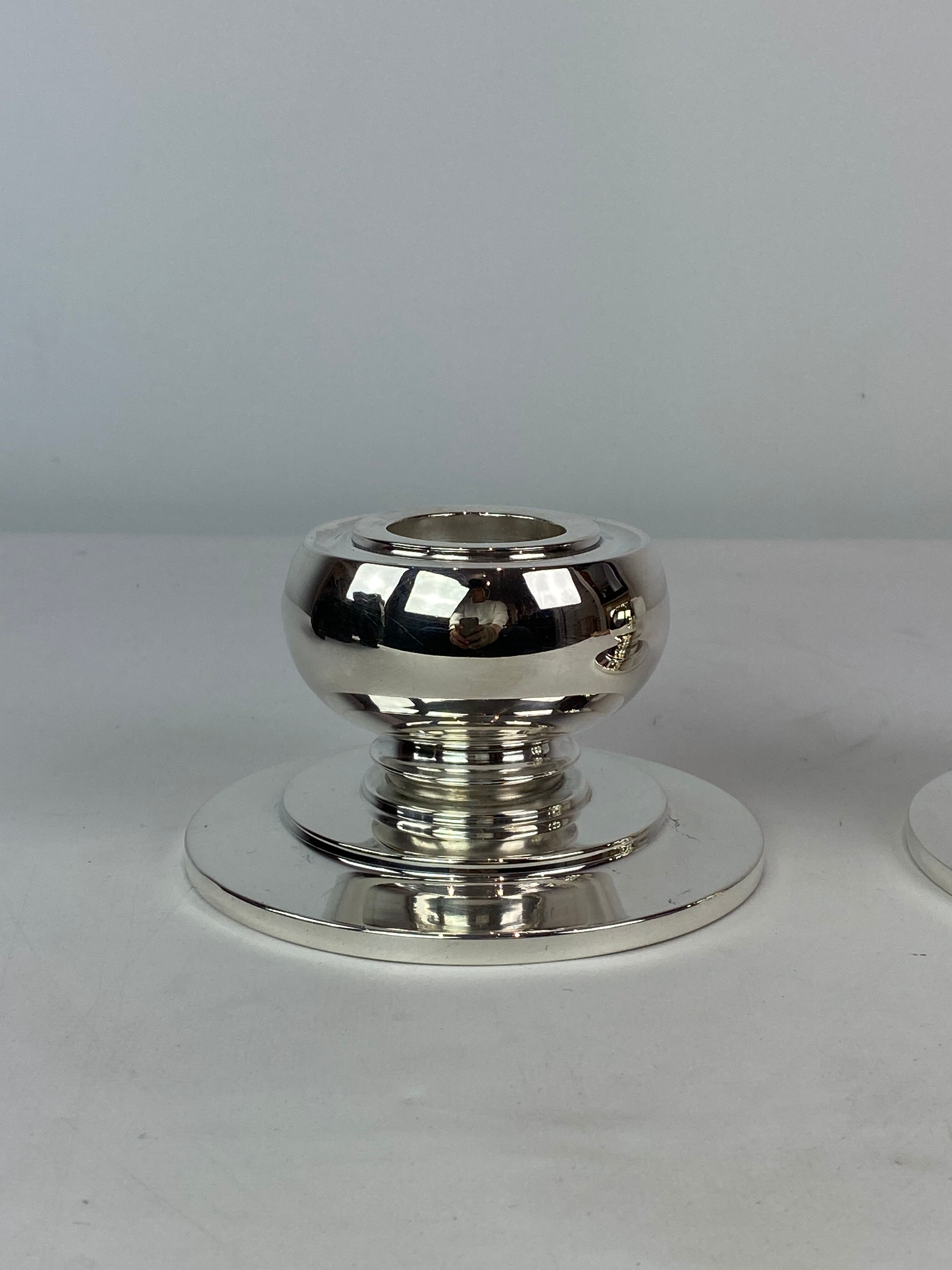 Set of two low candlesticks of 925 sterling and hallmarked silver, 1930s