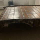 Elephant saddle coffee table in wood and metal