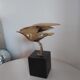 Vintage brass bird on pedestal