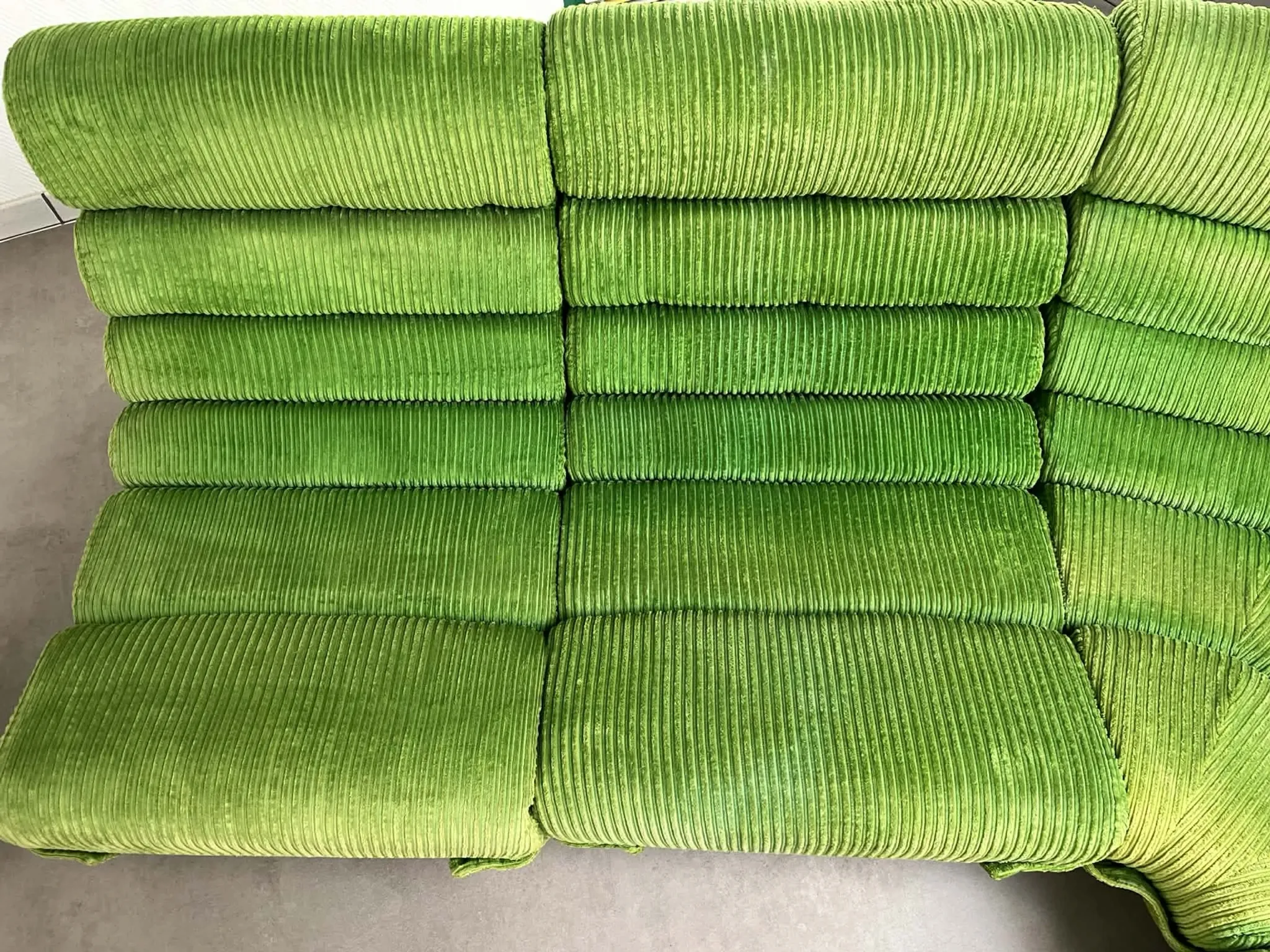 Modular green velvet corner sofa, 1970s
