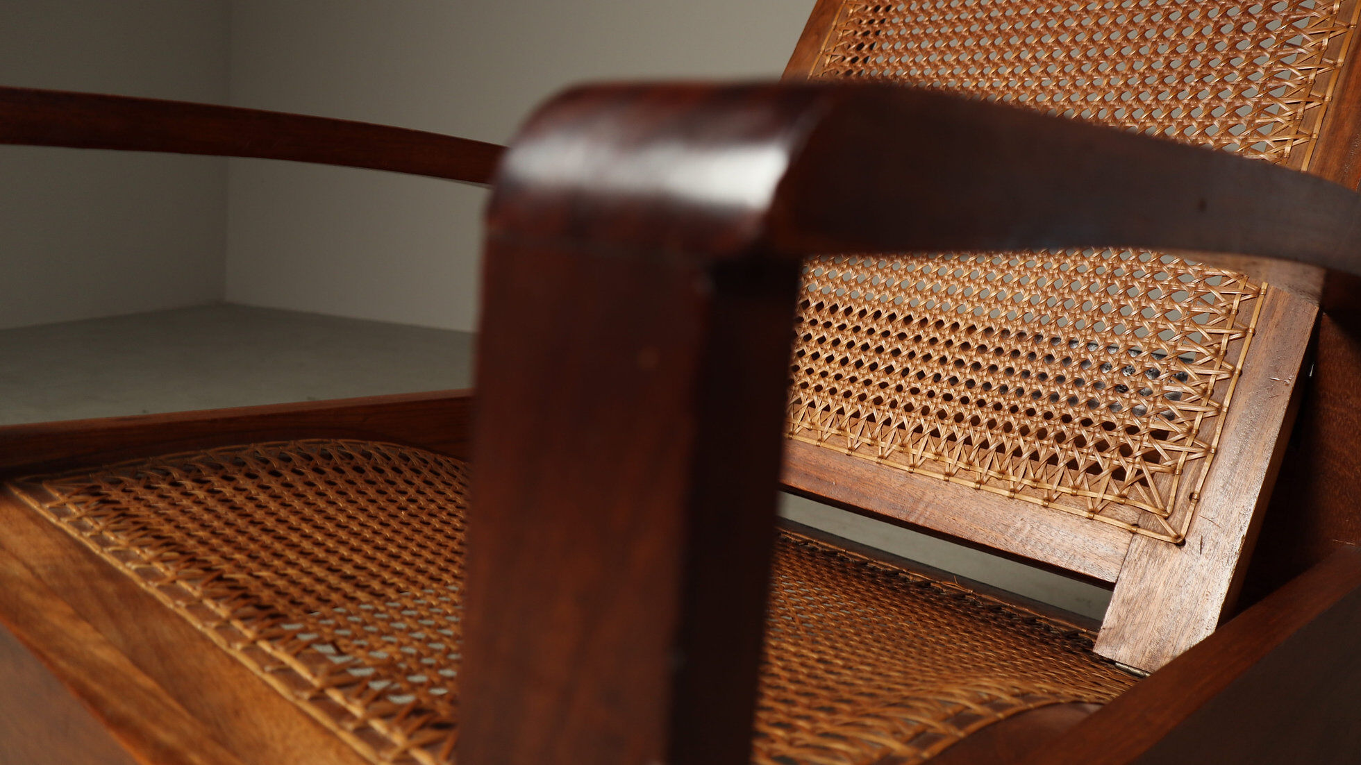 Mid-century architectural teak lounge chair with cane seat, 1950s