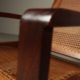 Mid-century architectural teak lounge chair with cane seat, 1950s