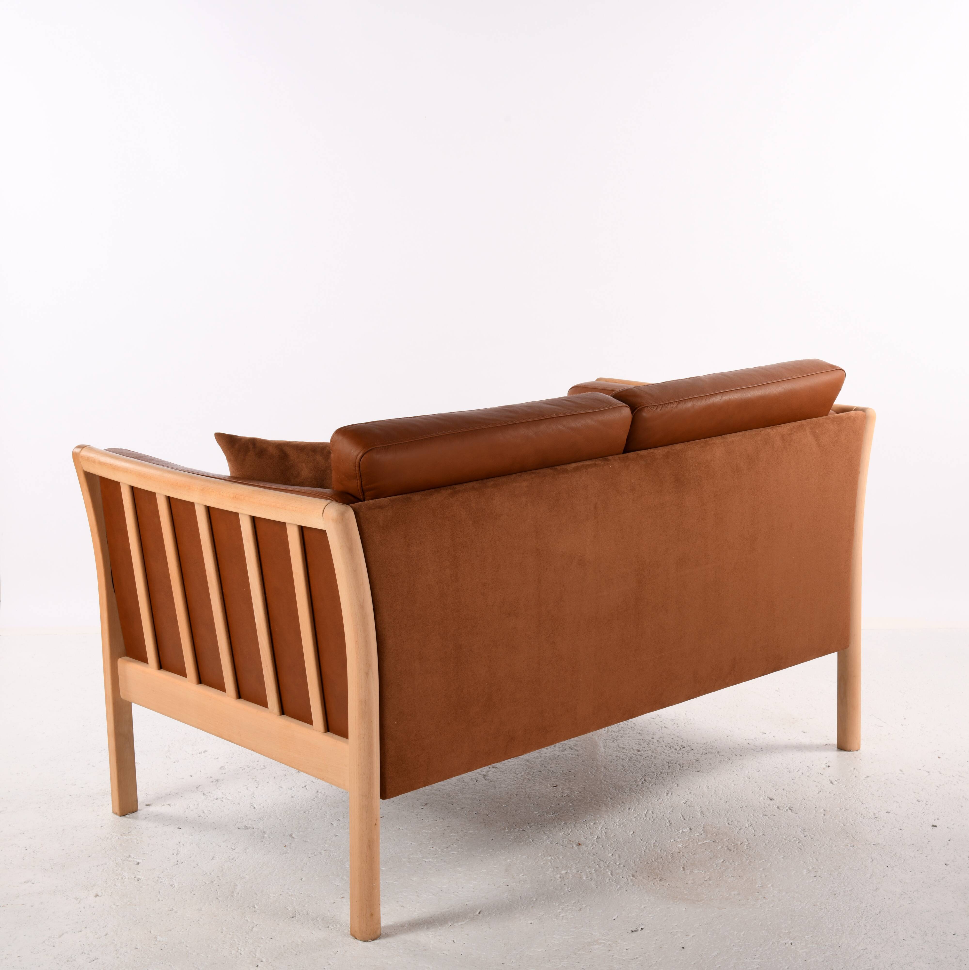 Scandinavian 2-seater leather sofa