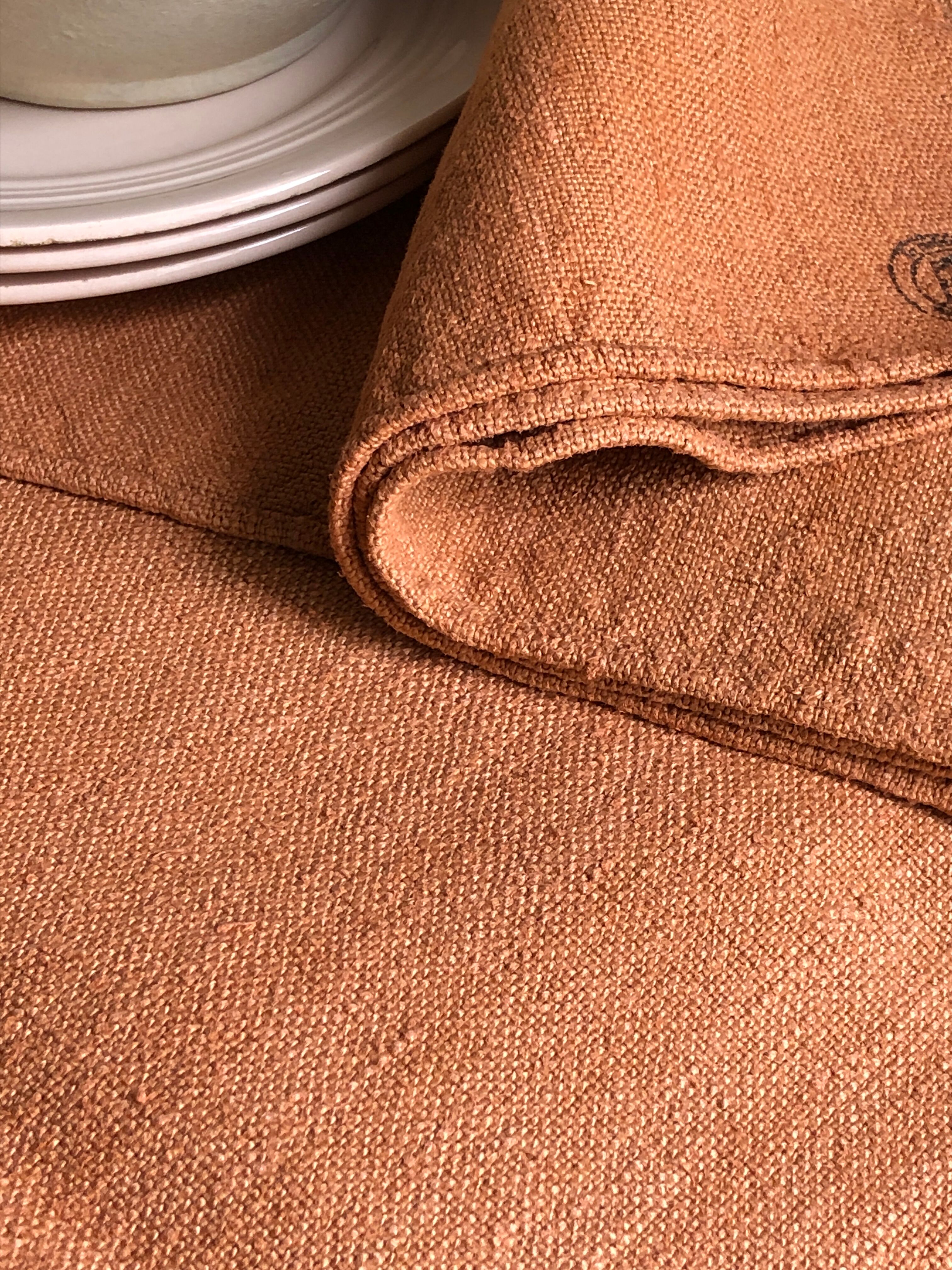 Old harvest tablecloth in terracotta tinted hemp