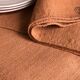 Old harvest tablecloth in terracotta tinted hemp