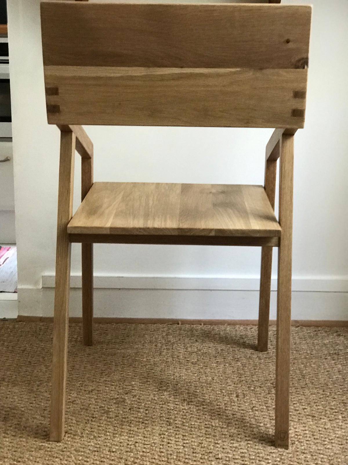 Set of 4 designer chairs in solid oak