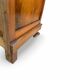 Antique walnut commode with bronze handles in the shape of a lion's mask,