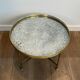 Brass coffee table with a vintage mirror top from the Baguès house.