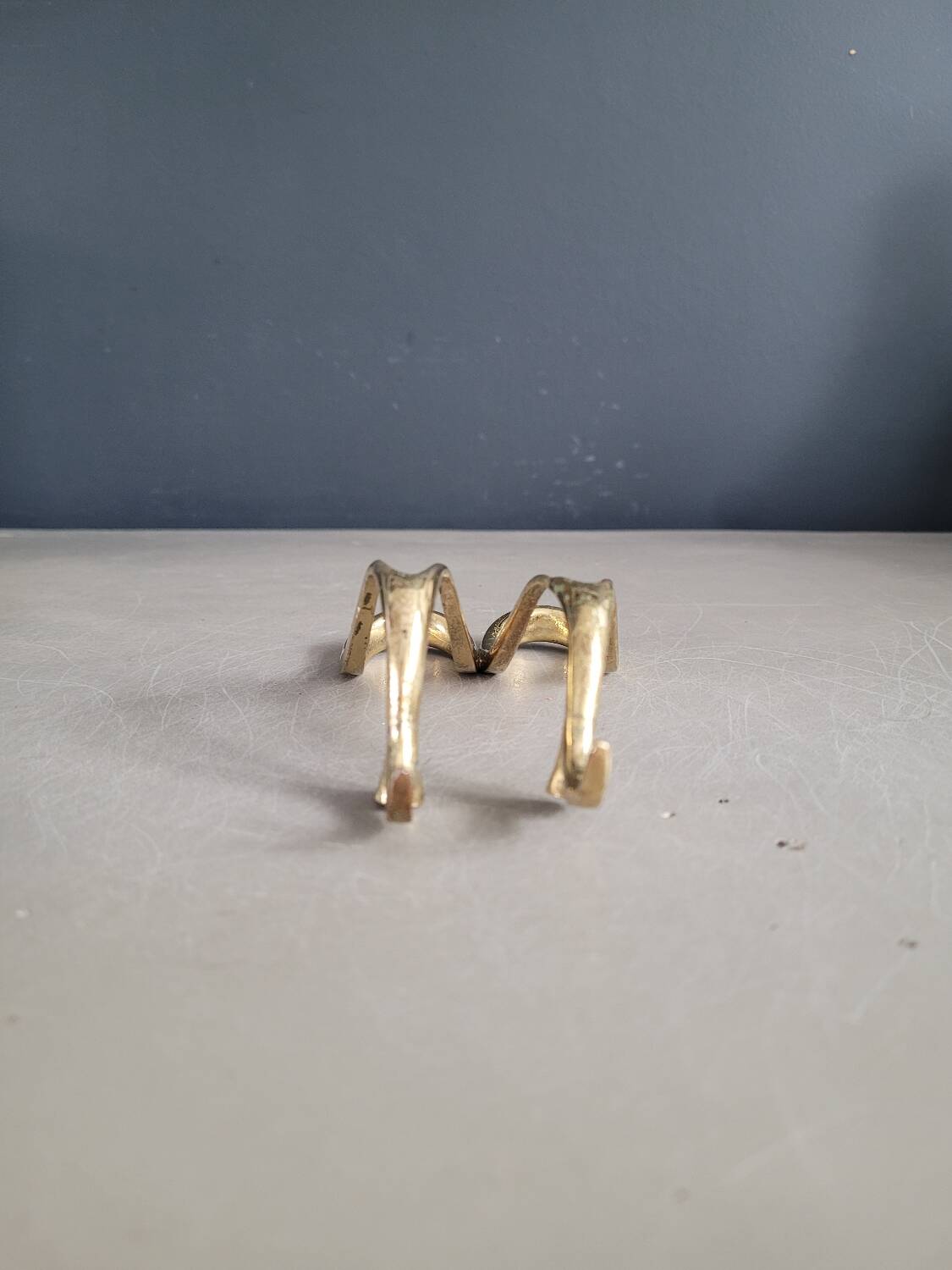 Antique brass pipe holder