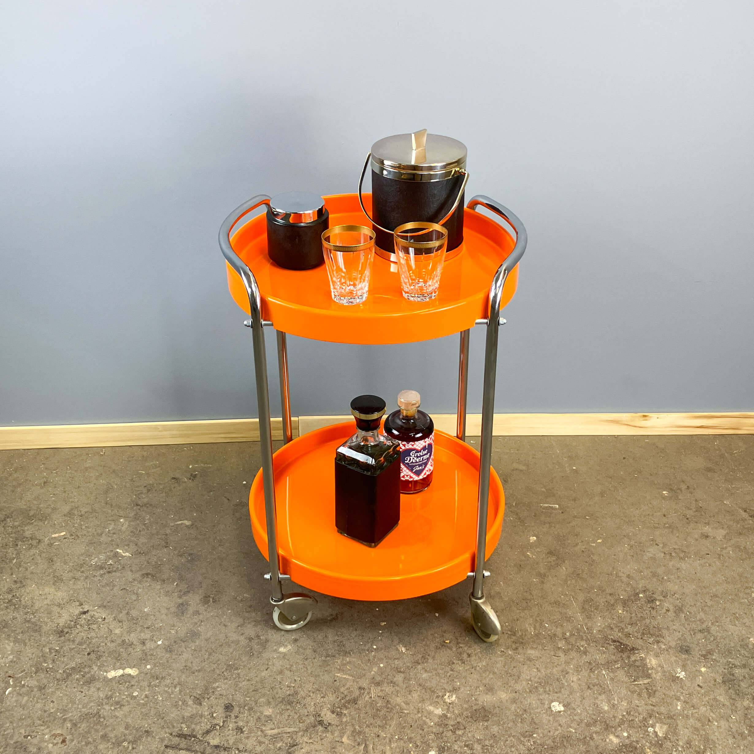 Space Age serving trolley, chrome and orange plastic trays, 1970s