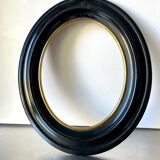 Black wooden oval frame