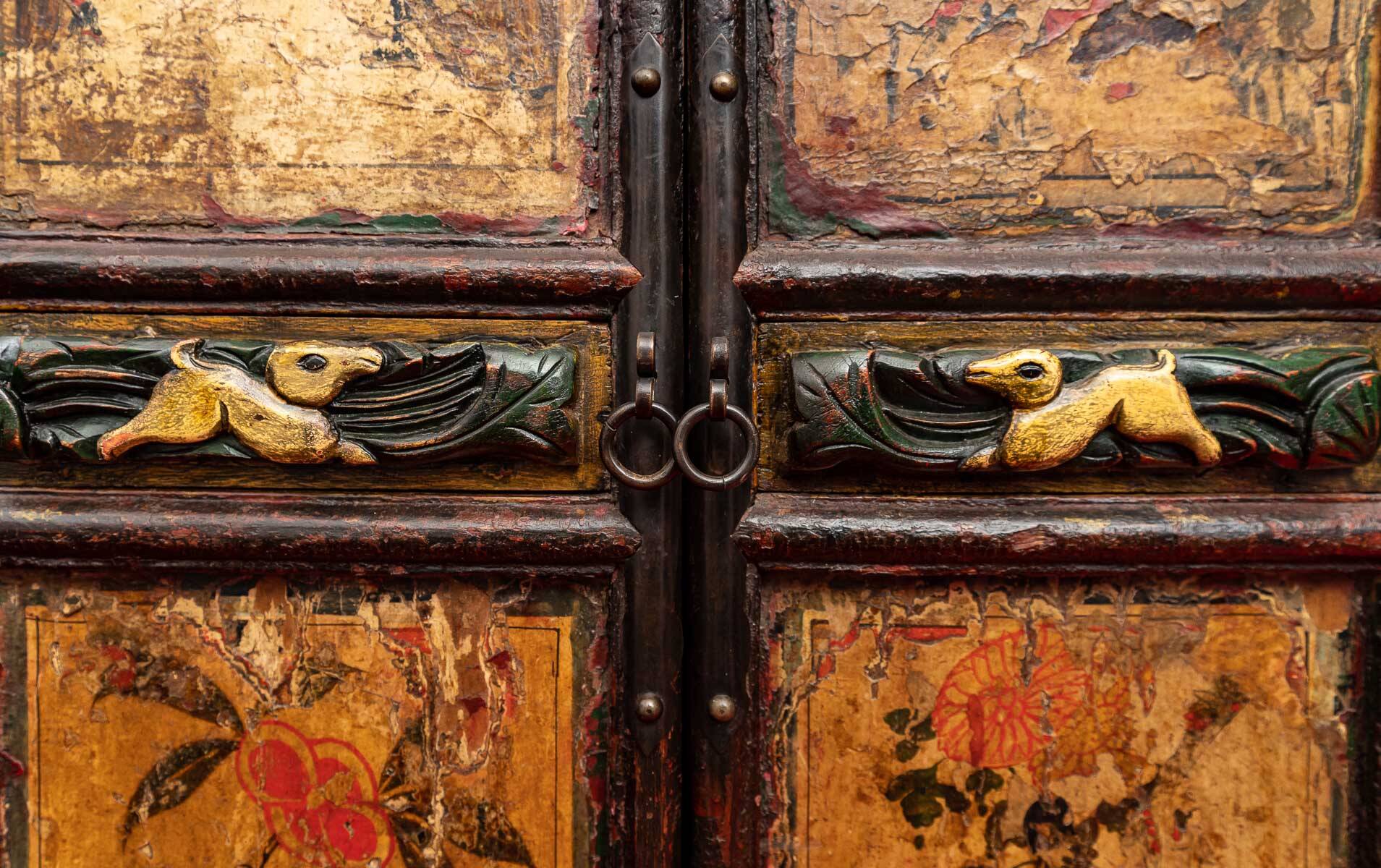Antique Chinese wardrobe with 4 doors and 3 drawers.