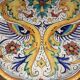 Decorative plate in earthenware. Signed Gima Dervta.