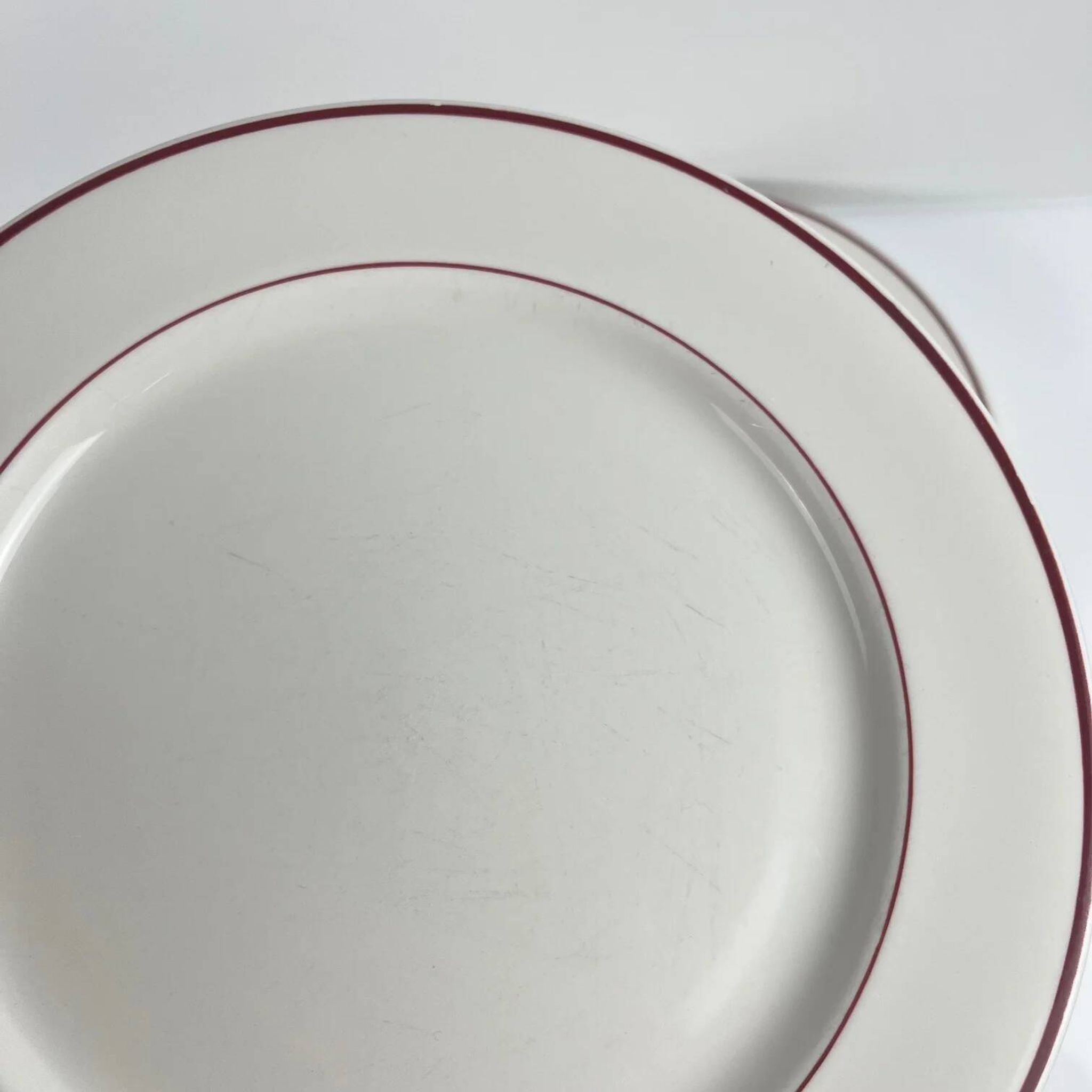 Set of 6 flat plates Villeroy & Boch, burgundy/purple rim, 20th century.