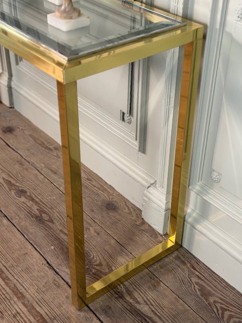 Golden and chrome metal console, bevelled glass, circa 1980.