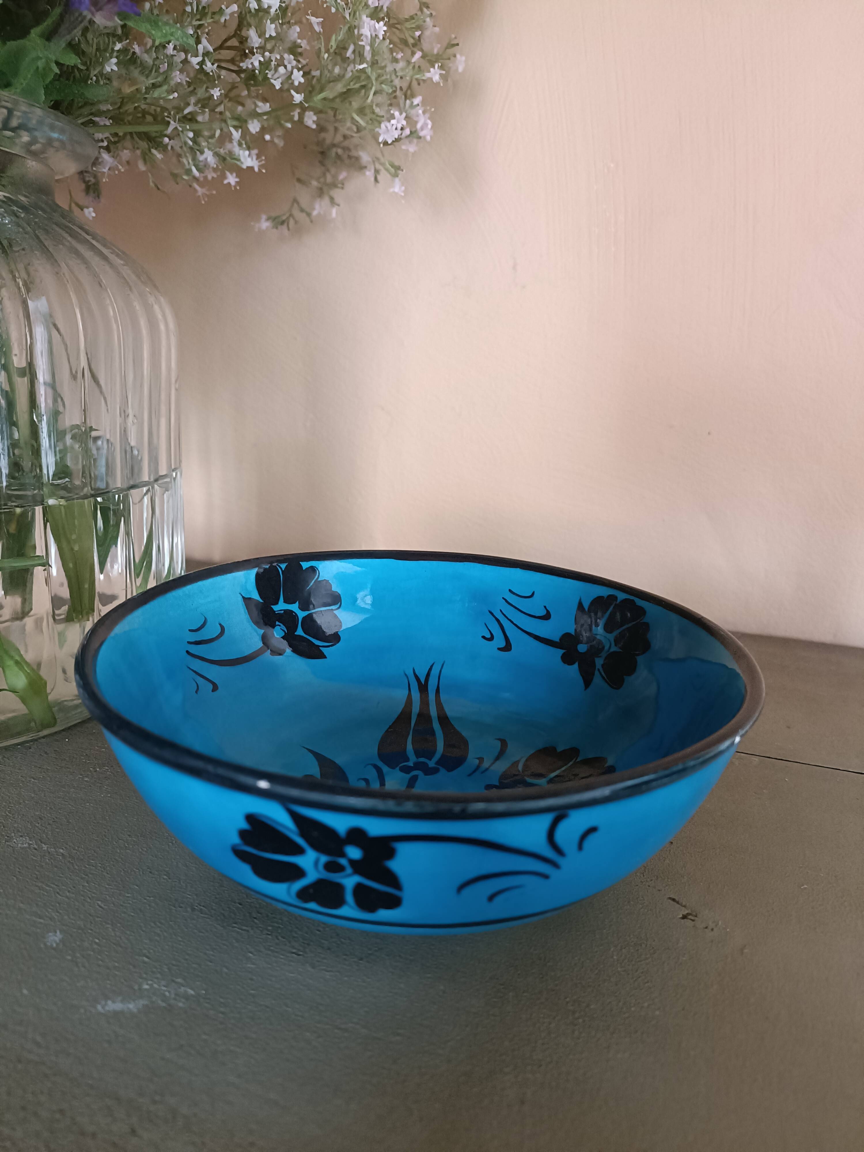 Blue earthenware bowl with floral decoration