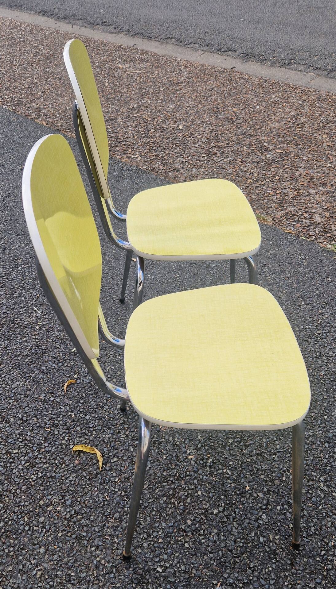 pair of yellow Formica chairs