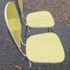 pair of yellow Formica chairs