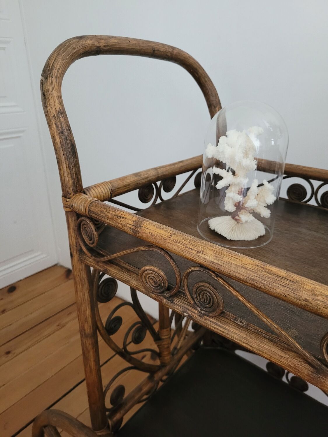 Bamboo and rattan dessert table in peacock style.