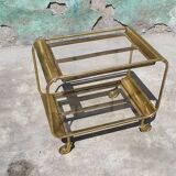 Old rolling coffee table serving vintage brass bar 50s mid-century design