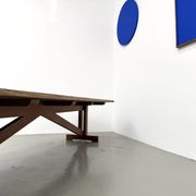 Refectory table in solid pine and beech, with X-shaped legs.