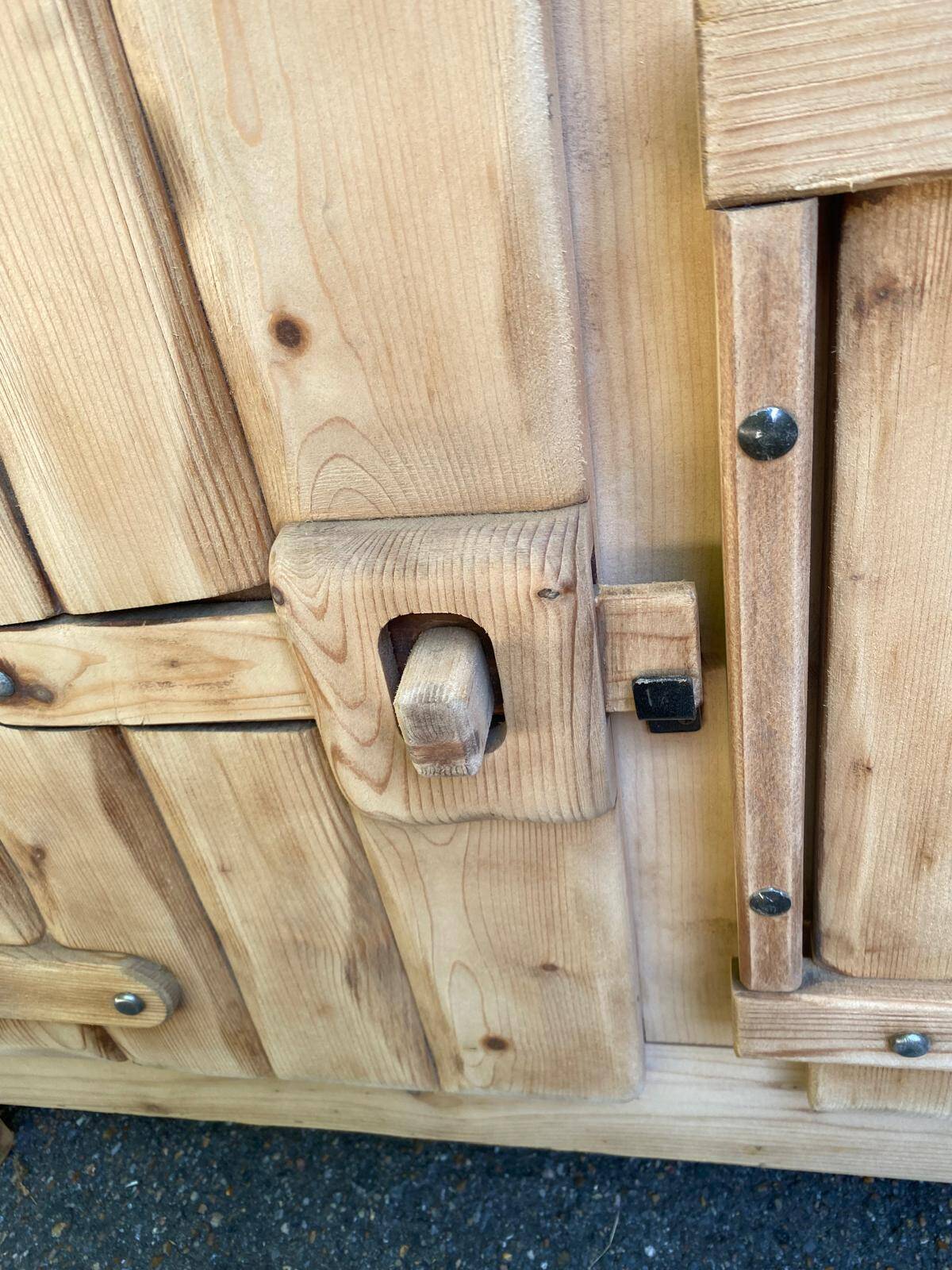 Row of renovated light solid wood chalets from the 1970s.