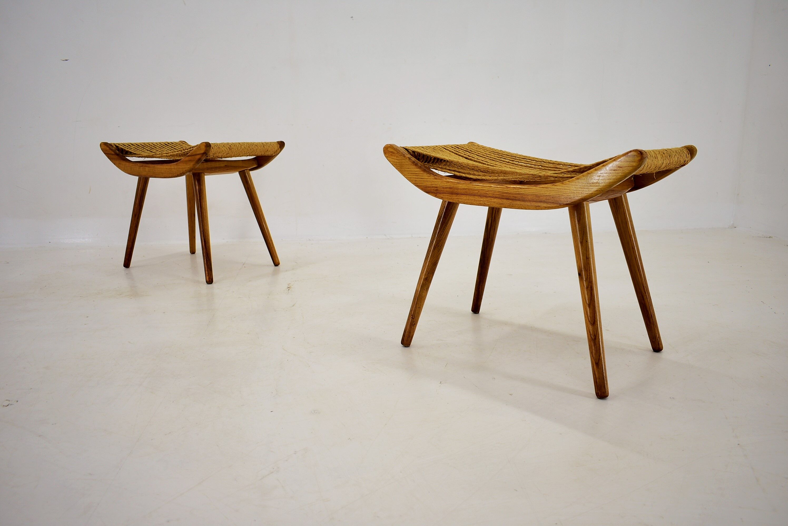 Pair of beech straw stools, 1960s, Czechoslovakia