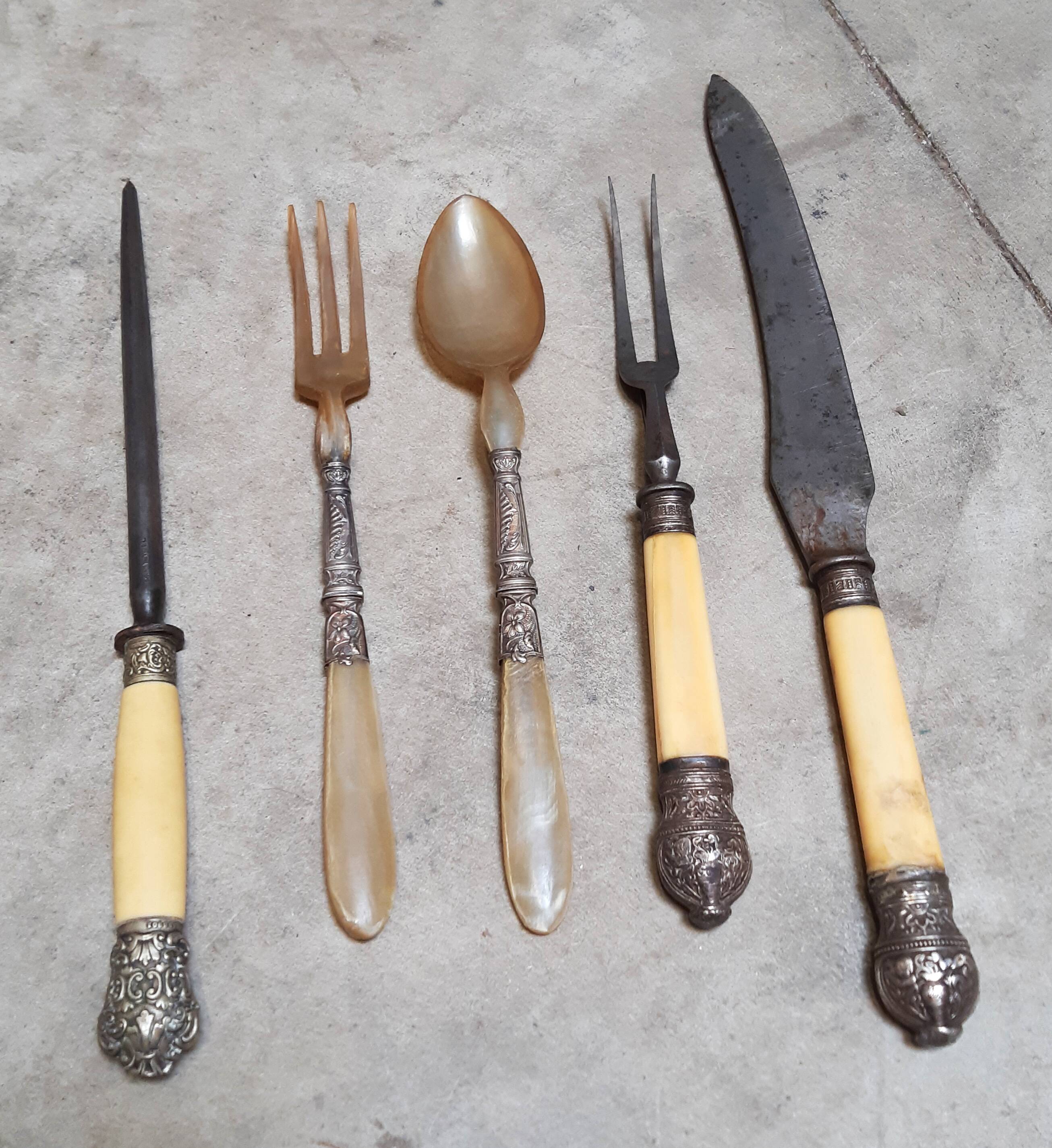 Assortment of antique serving cutlery