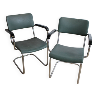 2 vintage armchairs green leather metal armrests black wood 1950 suede