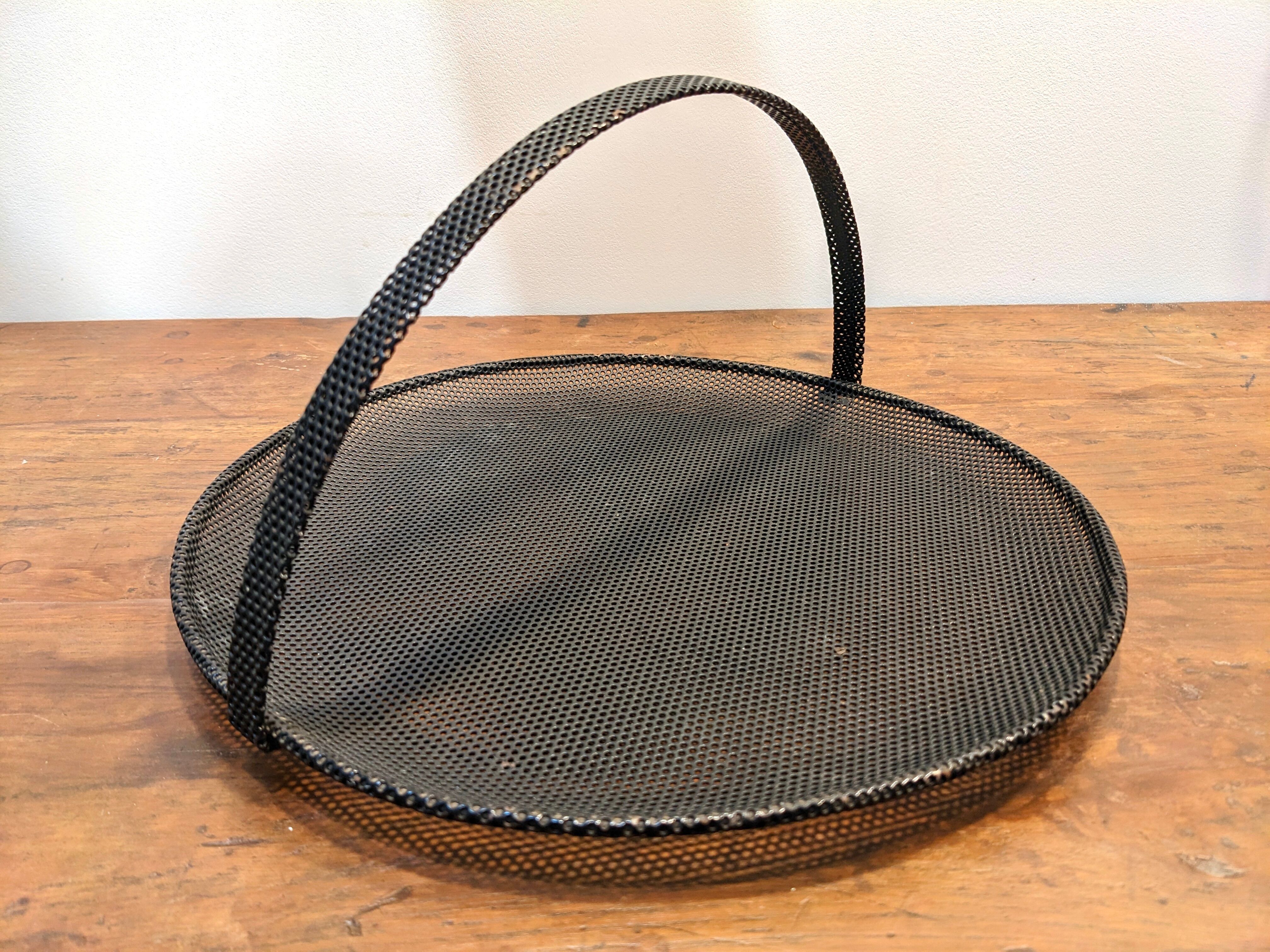 Black metal basket by Mathieu Mategot