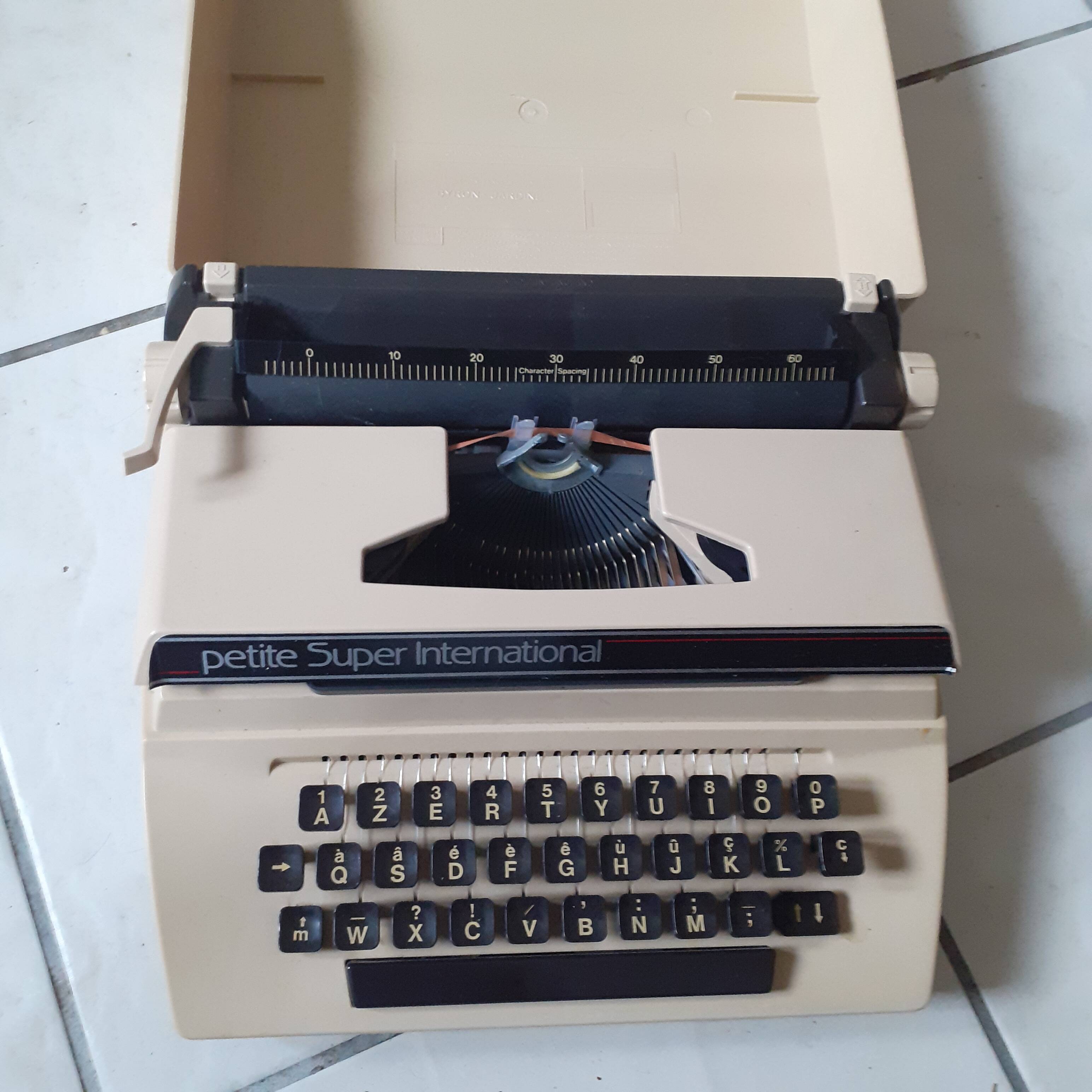Beige typewriter for children. La Petite