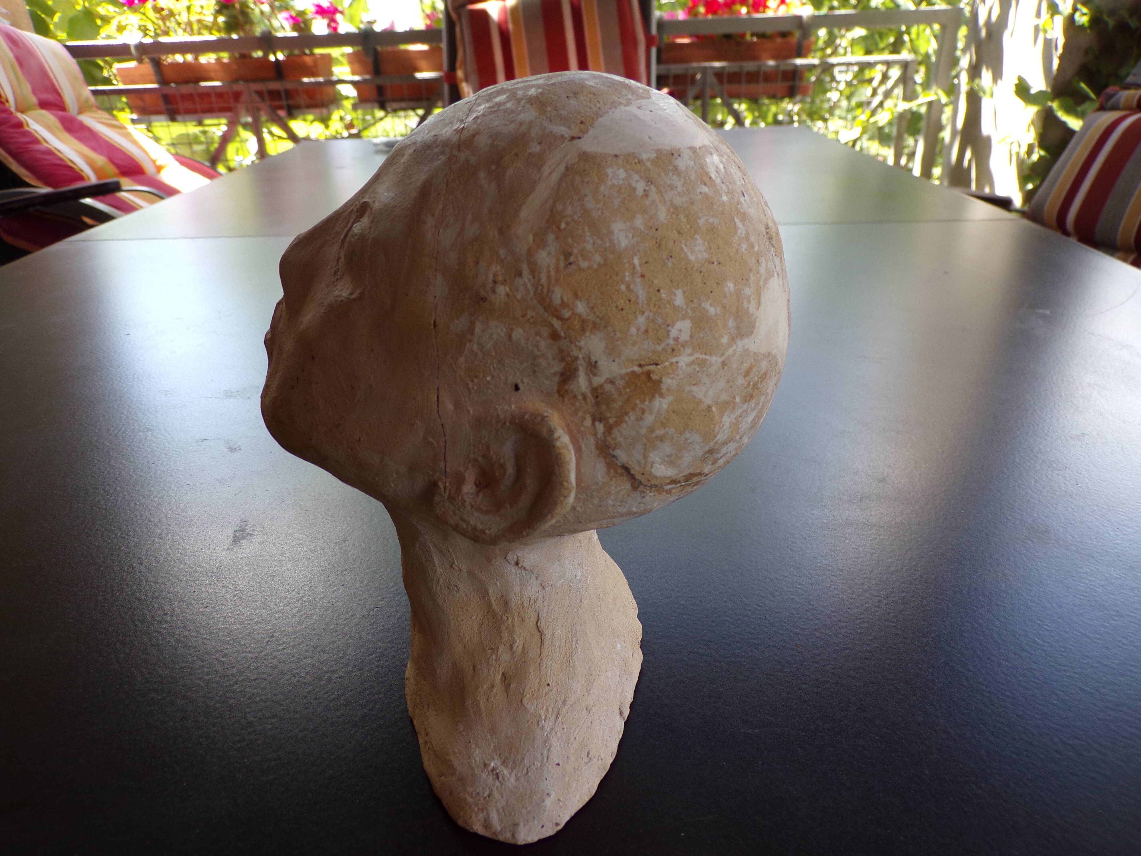 Child bust in terracotta