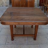 Extendable Art Nouveau table in carved walnut, circa 1900
