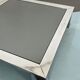 Mid-century chrome and dark mirror glass side table attributed to Saporiti. Italy 1970s