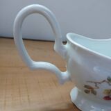 Saucière ancienne en porcelaine
