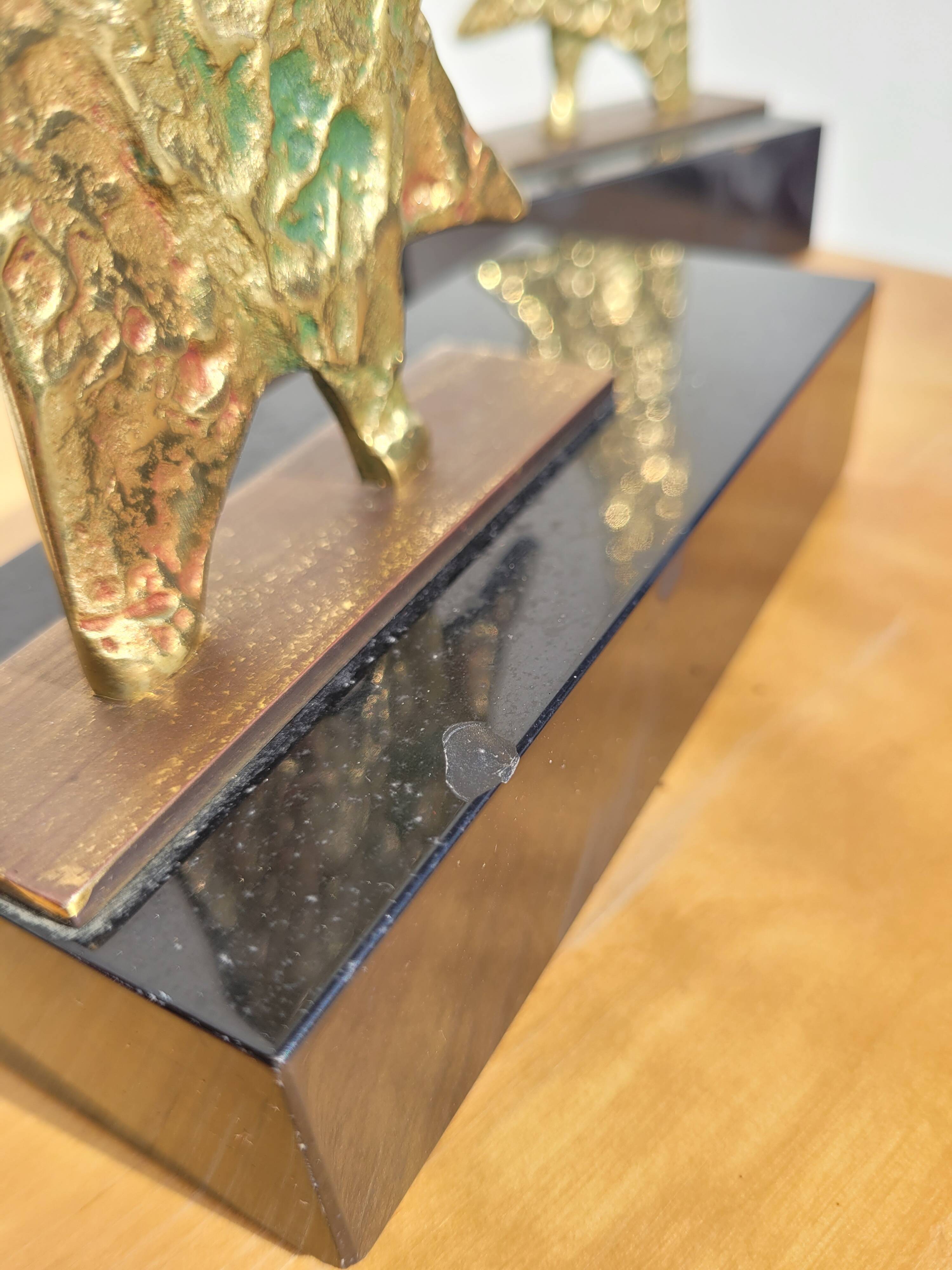 Serre livres en bronze doré vers 1960