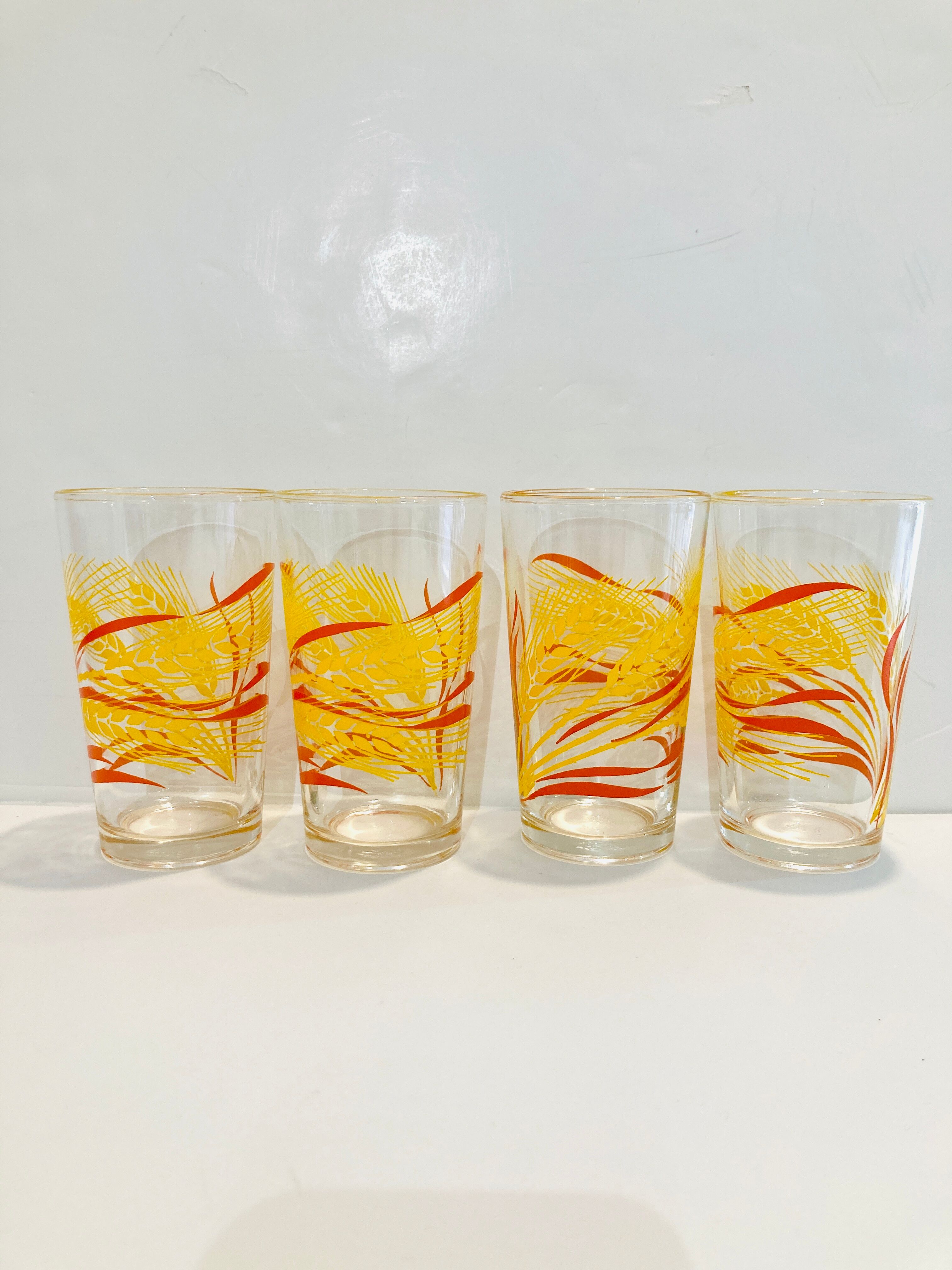 4 glasses orange and yellow wheat pattern