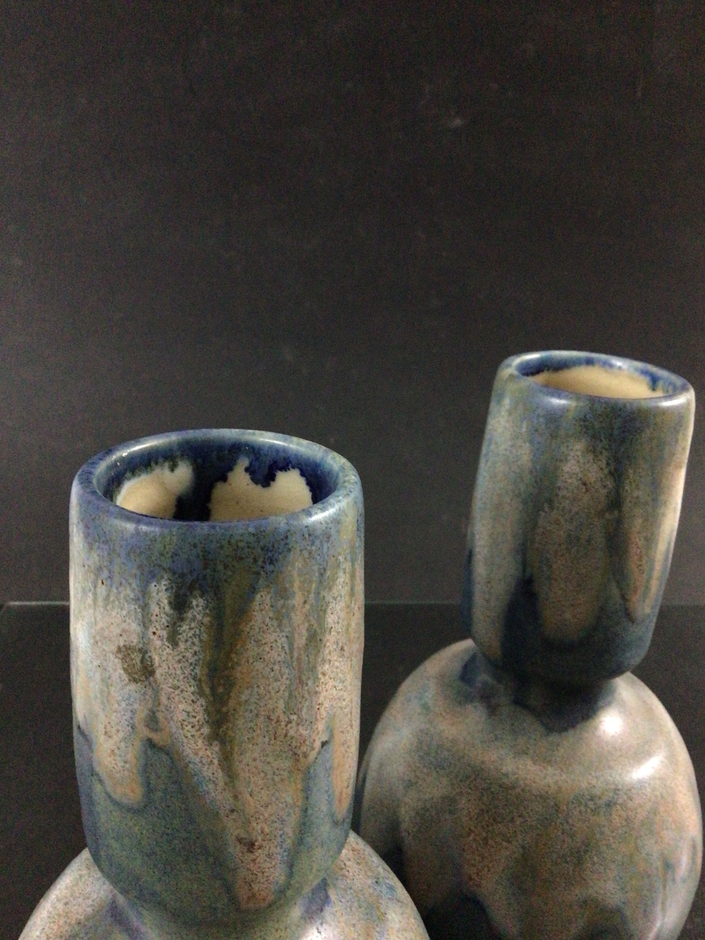 Pair of sandstone vases signed Lebret