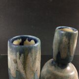 Pair of sandstone vases signed Lebret