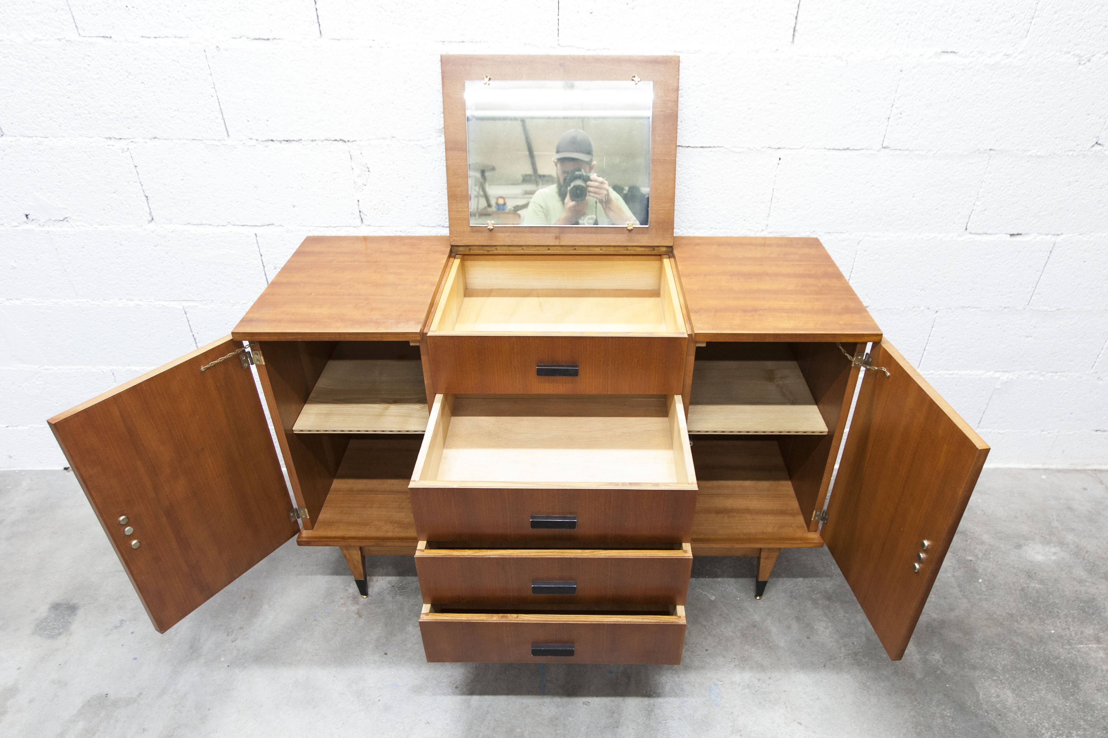 1960s teak sideboard with 4 drawers, 2 doors, and a mirror.