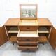 1960s teak sideboard with 4 drawers, 2 doors, and a mirror.