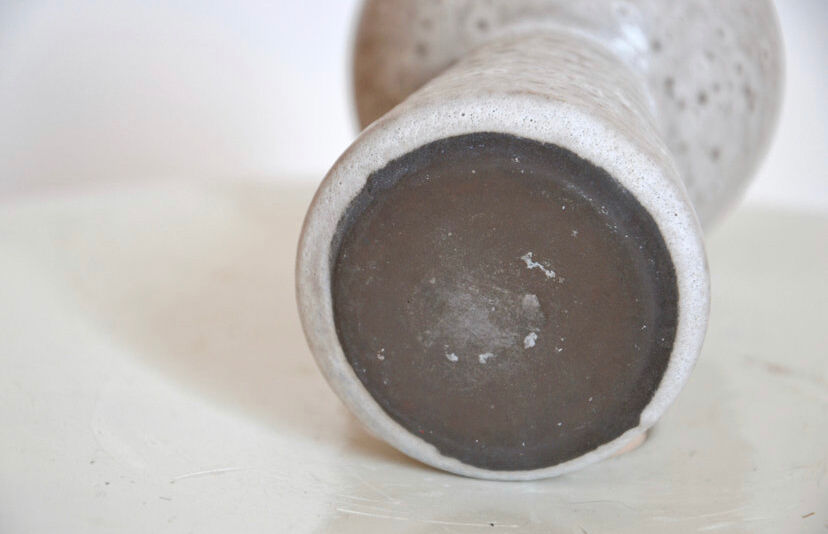Minimalist gray ceramic vase in design shape