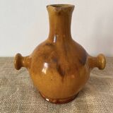 Provençal jug in orange/caramel glazed earthenware