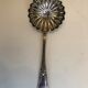 Silver sprinkler spoon