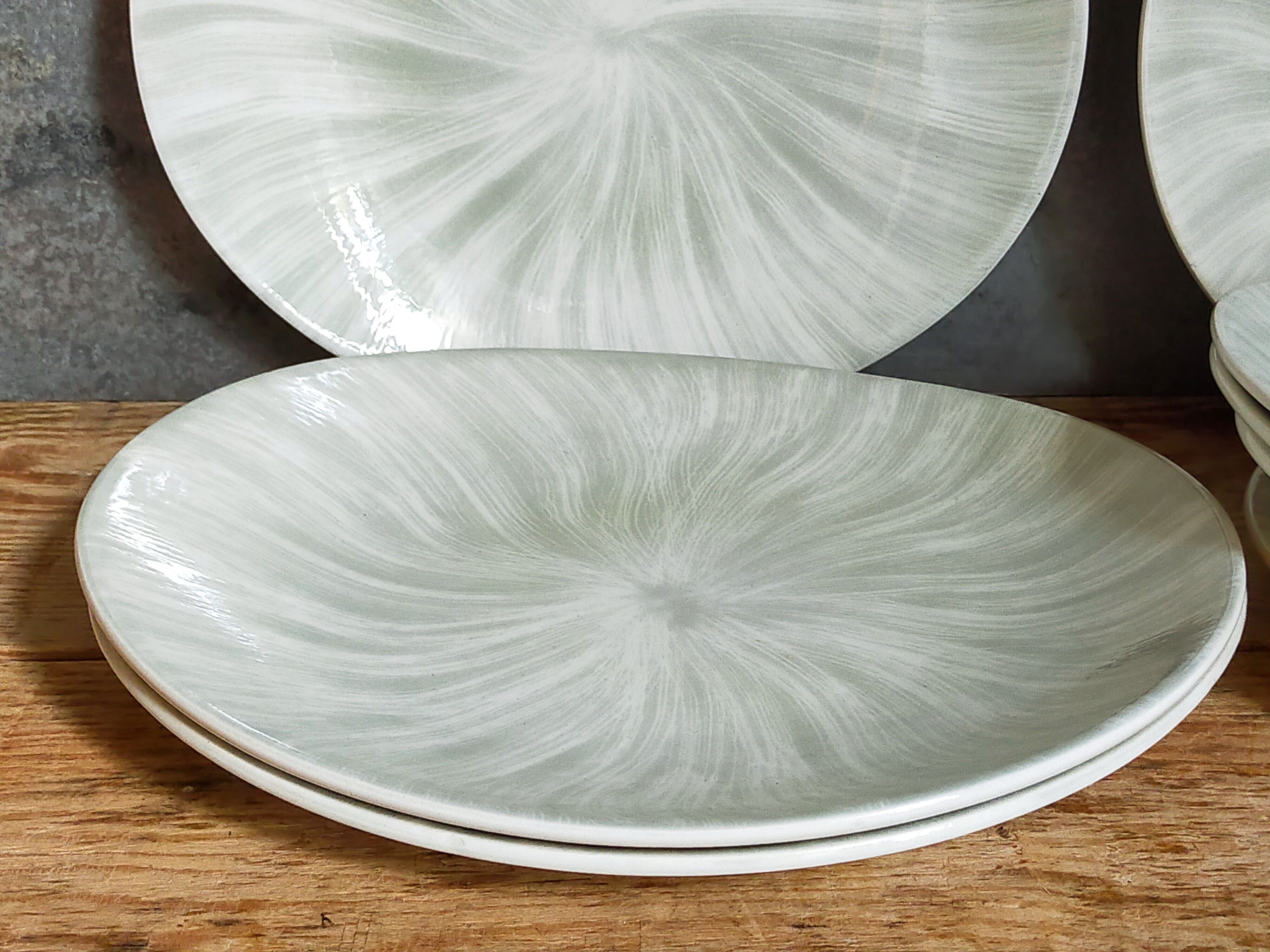 Nine earthenware plates from Salins-les-Bains vintage