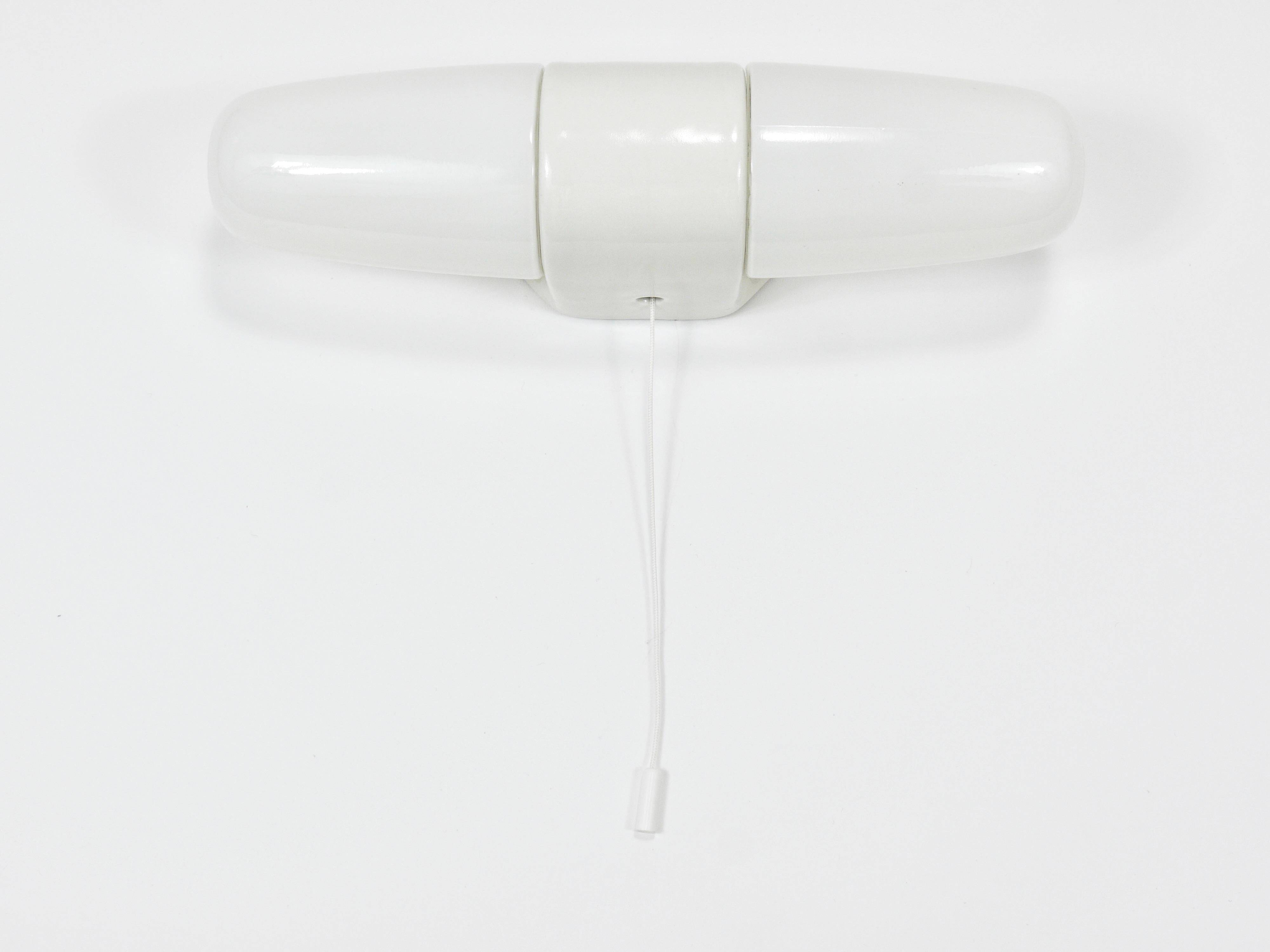 White double wall lamp Bauhaus Wilhelm Wagenfeld, Linder Germany, 1950s