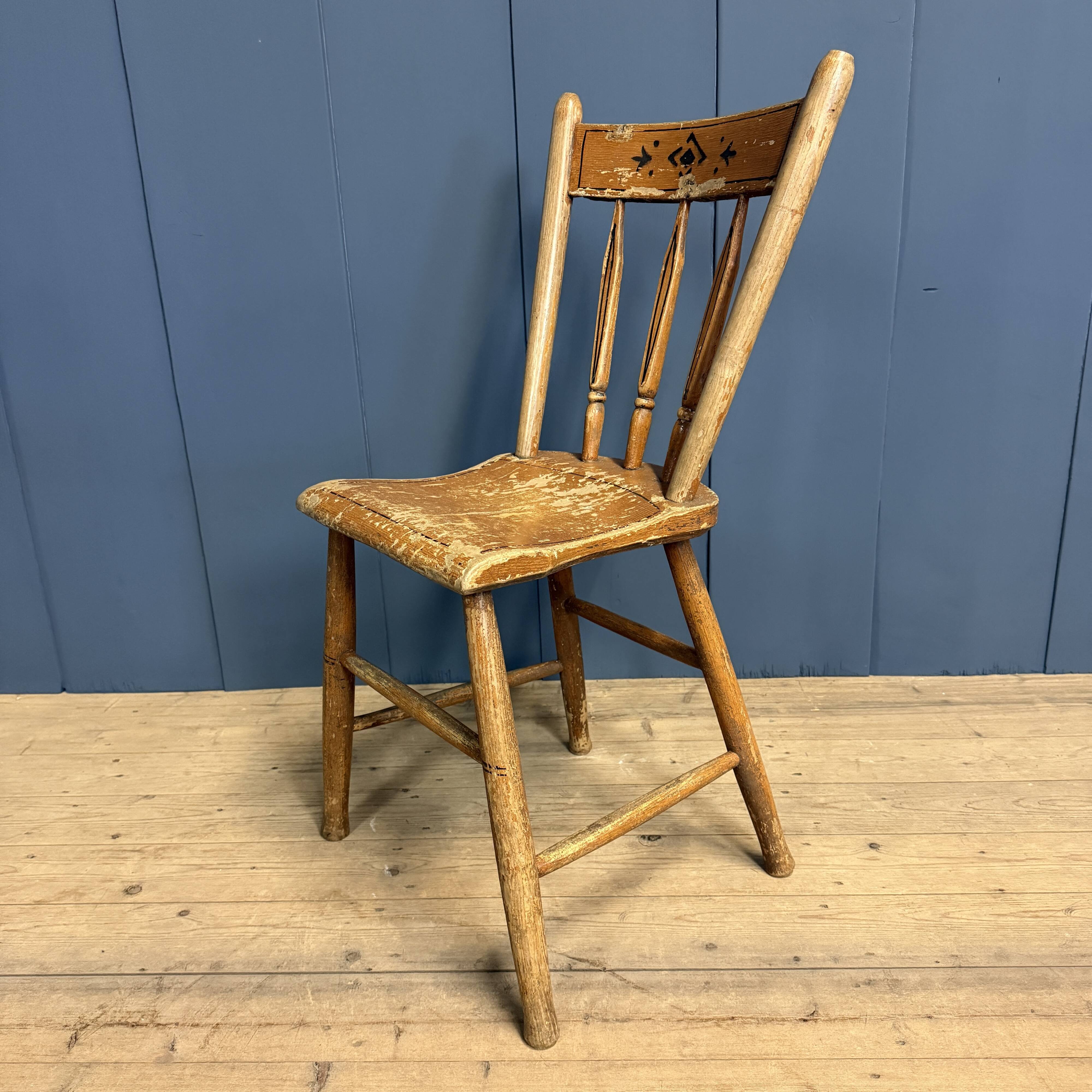 Set of four painted Dutch kitchen chairs.