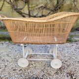 Wicker cradle on wheels, late 19th century