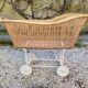 Wicker cradle on wheels, late 19th century