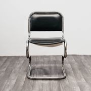Ensemble de 4 chaises à bascule en acier chromé design années 80 vintage moderne.